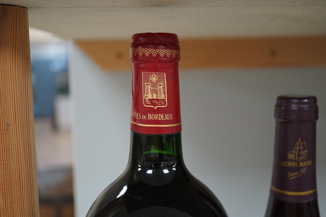 Five bottles: including a bottle of Chateau Corps de Loup, premieres cote de Blaye 1990